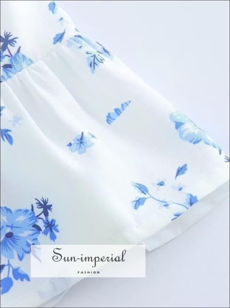 Sun-imperial - womens White with blue floral print corset style strapless mini dress with ruffle White / L Sun-imperial - womens White with blue floral print corset style strapless mini dress with ruffle White / L