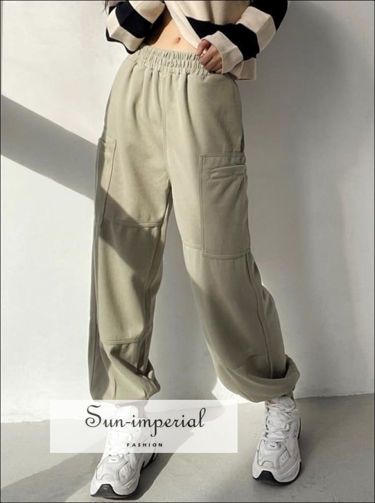 http://sun-imperial.com/cdn/shop/products/sun-imperial-women-cotton-black-large-pocket-joggers-long-cargo-sweatpants-high-street-fashion-basic-style-casual-harajuku-sporty-620_1200x1200.jpg?v=1634770341