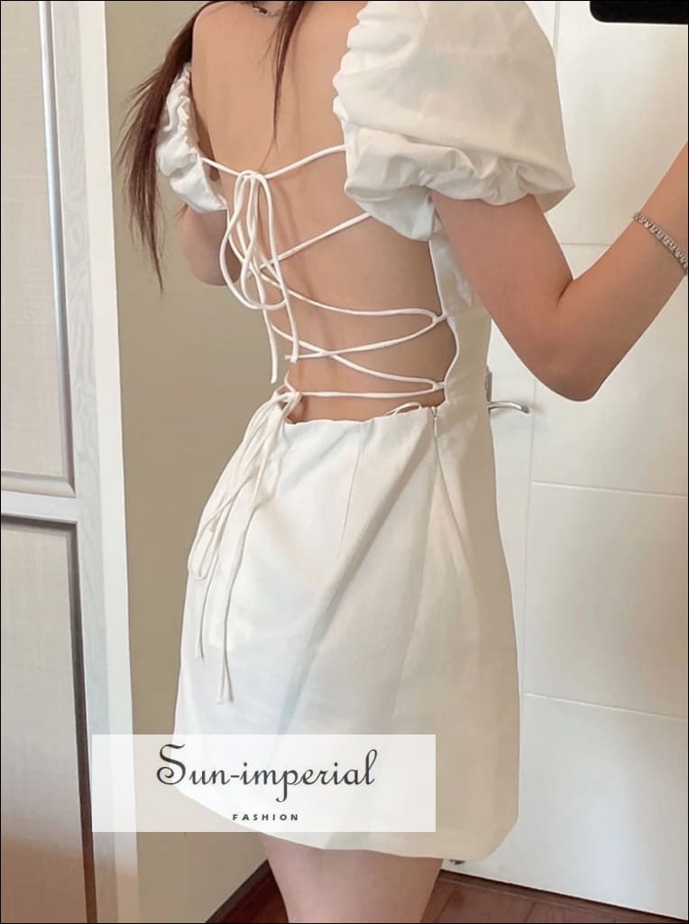 Sun-Imperial - Backless Mini Dress with Short Puff Sleeve and Ruched Bodice Detail White / Xs Sun-Imperial - Backless Mini Dress with Short Puff Sleeve and Ruched Bodice Detail White / Xs