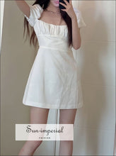 Backless Mini Dress With Short Puff Sleeve And Ruched Bodice Detail Sun-Imperial United States