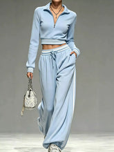 Plus size half-zip cropped top and matching pants set in light blue from Sun Imperial