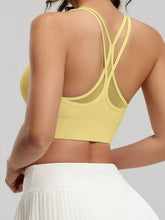 Scoop-neck stretch active sports bra in pastel yellow from Sun Imperial