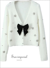 White Pointelle Knit V-neck Cropped Cardigan with Bow Detail bow detail sweater, button front cardigan, cropped knit everyday top, feminine