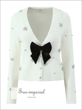 White Pointelle Knit V-neck Cropped Cardigan with Bow Detail bow detail sweater, button front cardigan, cropped knit everyday top, feminine