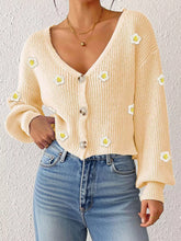 Women's feminine floral cropped cardigan with button front