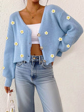 Women's cropped cardigan with floral appliqué detailing