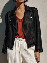 Women's black fringe hem zip-up jacket with statement fringe detail