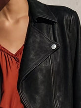 Women's fringe zip-up jacket in black for casual statement outfits