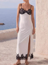 Women's white polka dot lace trim maxi dress with spaghetti straps and side slit