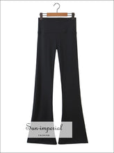 Black stretch flare pants with side slit - Sun Imperial (photo 1)