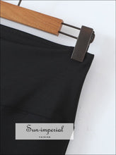 Black stretch flare pants with side slit - Sun Imperial (photo 5)